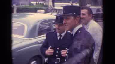 Germany (1962): Old Footage Of Two Men In Uniforms And A Third Man In A White