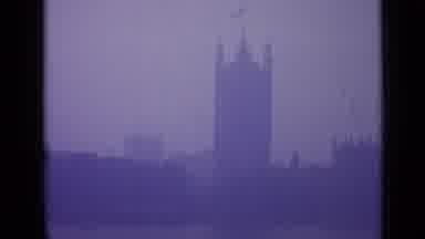 London England-1962: Old Camera Panning Through A Hazy London Cityscape