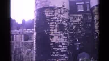 London England (1962): n Old Damaged Castle On A Cloudy Day As People Walk Around