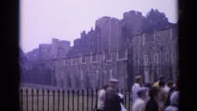 London England (1962): Footage Of People Walking Up To A Castle And A Close Up Of