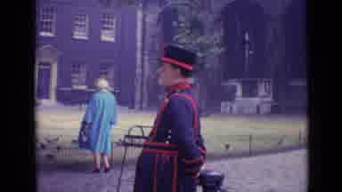London England (1962): Woman Excitedly Taking Photo With Man In Royal British