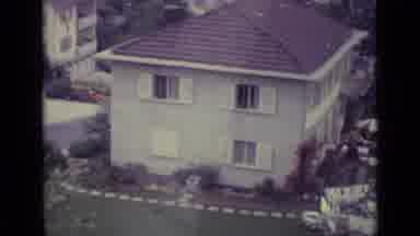 Lucerne Switzerland (1962): View Of Silver Sky Tram And A White House With Green