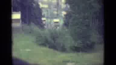 Lucerne Switzerland (1962): Downward View Of Lush Grassy Field Trees And People