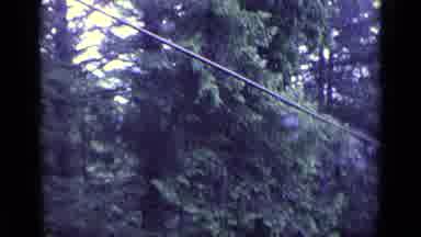 Lucerne Switzerland (1962): A Cable Car Rides Metal Wires While Traversing A