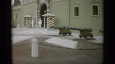 Monaco City-1962: Camera Pans Along The Facade Of Building And Row Of Cannons