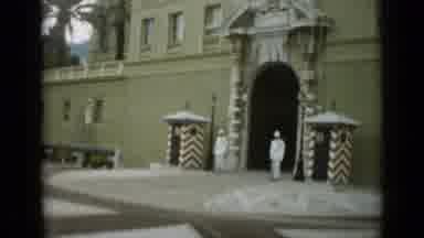 Monaco City (1962): Large Group Of Men And Women Walk Up The Steps Of The Building