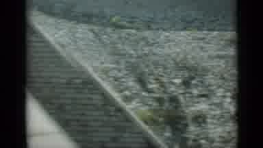 Monaco City (1962): Drive By Footage Of Houses Log Cabin Houses And Then A City