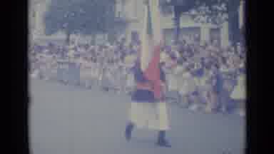 Nice France-1962: Marching Band In Red Uniforms Walking In A Parade