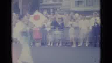 Nice France (1962): A Parade With Japanese And People From Kentucky With A Wooden
