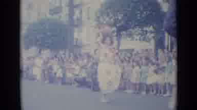 Nice France (1962): Women In Traditional Dresses March In A Parade With A Man In A