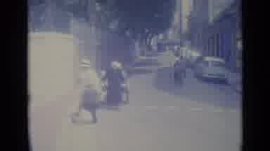 Nice France (1962): Vintage Old Lady Pulling Full Wagon Down Street Daytime City