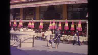 Paris France (1962): A Bustling City Filled With People Walking And Driving About