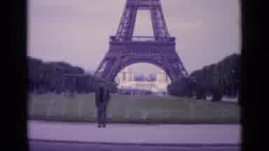 Paris France (1962): View Of The Eiffel Tower In The Background On A Cloudy Day