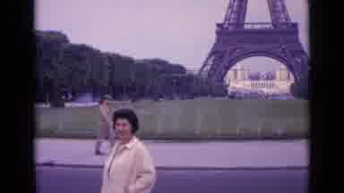 Paris France (1962): Woman Landing For Photo In Front Of The Eiffel Tower In Paris