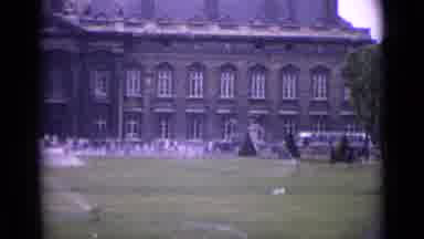 Paris France (1962): A Tall Tower And Building With Trees