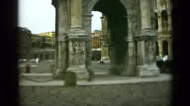 Rome Italy (1962): Motorcycle Drives Past Historical Buildings Man Steps Over A