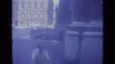 Rome Italy (1962): A Older Man On A Bike Riding Next To The Cars On The Street The