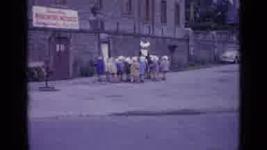 Switzerland (1962): Group Of Children Hold Hands And They Follow A Nun