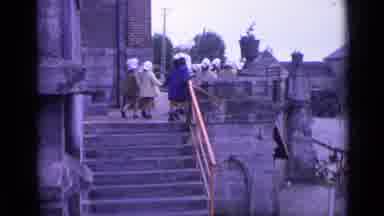 Switzerland (1962): People Go Up The Steps Of The Building And Take In The Sights