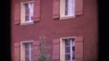 Switzerland (1962): A Color Video Of A Photographer Walking In Front Of A Red