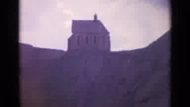 SWITZERLAND-1962: Two Vintage Buildings On A Hillside