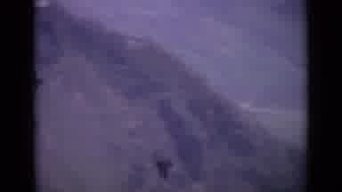 SWITZERLAND-1962: Birds And Shadows Flying Over Mountains And Valleys On A Sunny Day