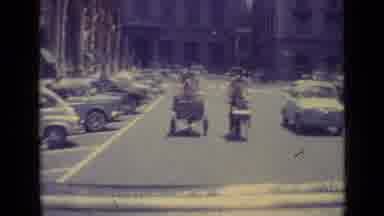 Vatican City (1962): European Gentlemen Filming Themselves Riding Through Traffic