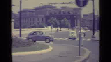 Vatican City (1962): People Walk Then Two Cars Speed By A Traffic Policeman