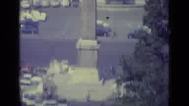 Vatican City (1962): An Obelisk Cars And Trees In A Square In Daylight