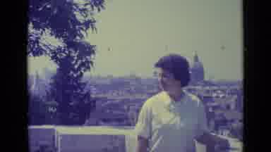Vatican City (1962): Woman Posing In A Garden With A City Scene In The Background