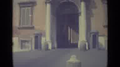 Vatican City (1962): A Big Building With An Open Door Concept And Stone Sculptures