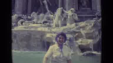 Vatican City (1962): A Woman Stands In Front Of A Large Fountain Made Of Stone