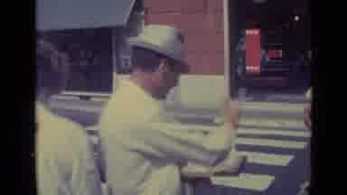 Vatican City (1962): People Talking Outside Of A Building And One Man Selling