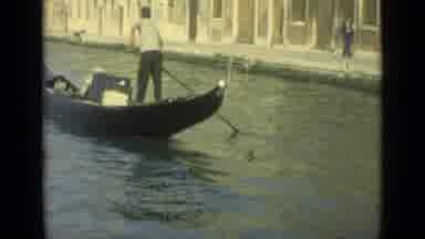 Venice Italy (1962): Man Paddling Customer Down A Canal With Their Luggage
