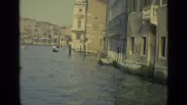 Venice Italy (1962): Man Wearing A White Shirt And Hat Rowing Canoe In Beautiful