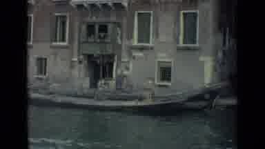 Venice Italy (1962): View Of Object Being Lifted Out Of Gondola Boat On A Clear