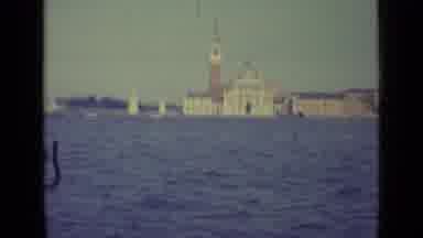 Venice Italy (1962): Ship Passing By Another White Ship At Sea Near A Port