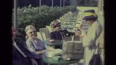 Venice Italy (1962): Woman Wearing Tan Jacket Waves At Camera On A Bright Sunny