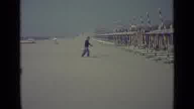 Venice Italy (1962): Man Makes Preparations On The Beach To Receive A Large Number