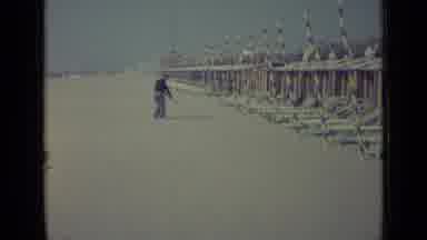 Venice Italy (1962): Man Cleaning A Beach