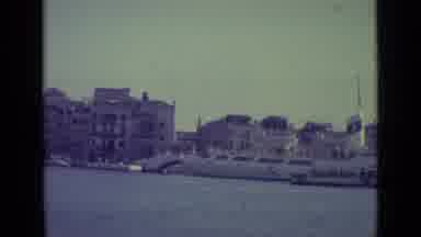 Venice Italy (1962): View Of White Buildings And Boats Traveling On Grand Canal On