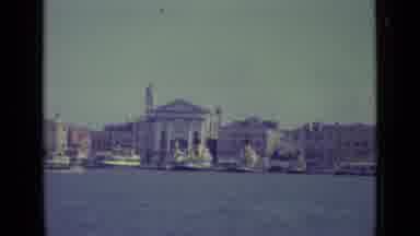 Venice Italy (1962): Boats On Water Near Island With Flags