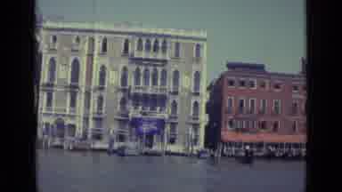 Venice Italy (1962): Buildings And Floating Gondolas In Venice Italy Along A Canal