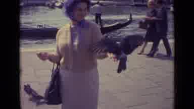 Venice Italy (1962): Lady Enjoying At The Market Place With Many Birds And Fun