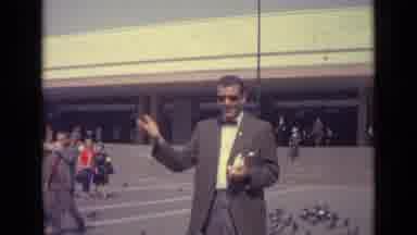 Venice Italy (1962): View Of White Tourboats And Man Wearing Grey Suit Feeding