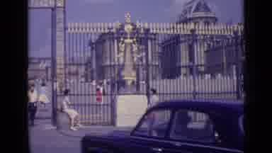 Versailles France-1962: Entrance View Of Historic Palace With Tourists And Classic Cars