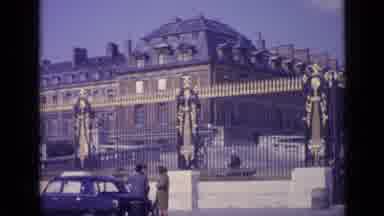 Versailles France (1962): Cars Driving By Statues