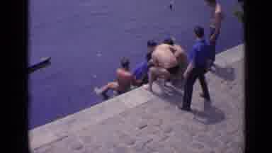 Versailles France (1962): People On A Curb Next To A Lake Pulling A Kid Out Of The