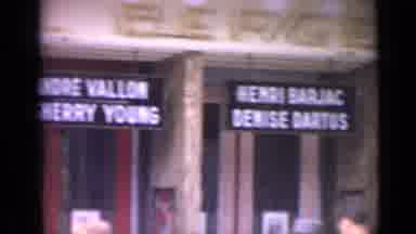 Versailles France-1962: Camera Pans Across Theater Marquee Signs Featuring French Actors