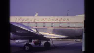 Versailles France (1962): A Man Taking A Suitcase Out Of An Airplane Down A Ladder